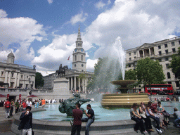 Fountain and equestrian statue of King George IV at Trafalgar Square, the National Gallery and the St. Martin-in-the-Fields church