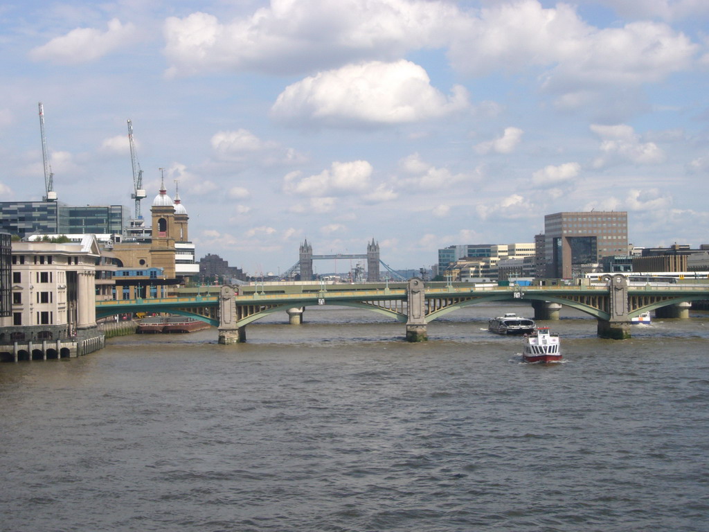 Cannon Street Station, the Southwark Bridge and the Tower Bridge over the Thames river, from the Millennium Bridge