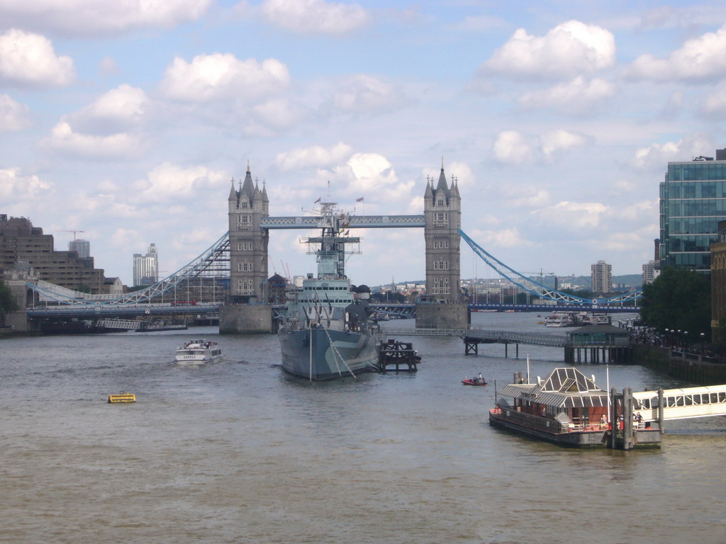 The Tower Bridge over the Thames river, the London Bridge City Pier and the HMS Belfast ship, from London Bridge