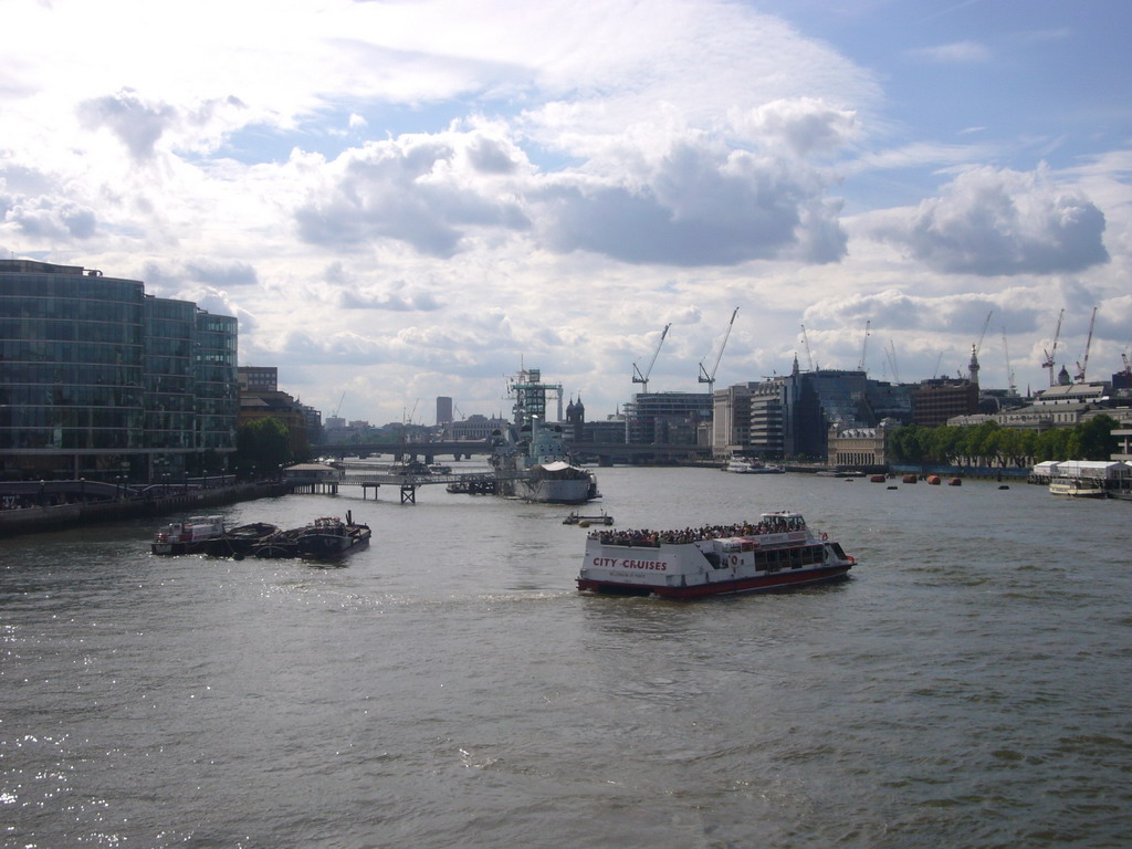 The London Bridge over the Thames river, the London Bridge City Pier and the HMS Belfast ship, viewed from the Tower Bridge