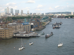 The Thames river and Canary Wharf, viewed from the east high level walkway of the Tower Bridge