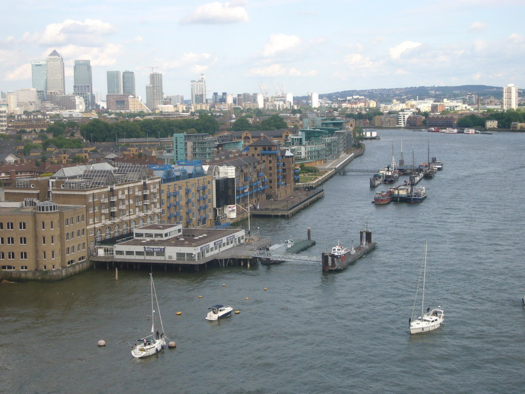 The Thames river and Canary Wharf, viewed from the east high level walkway of the Tower Bridge