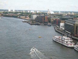 The Thames river and its south bank, viewed from the east high level walkway of the Tower Bridge