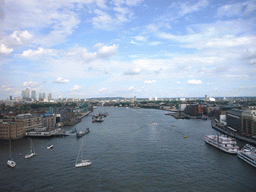 The Thames river and Canary Wharf, viewed from the east high level walkway of the Tower Bridge