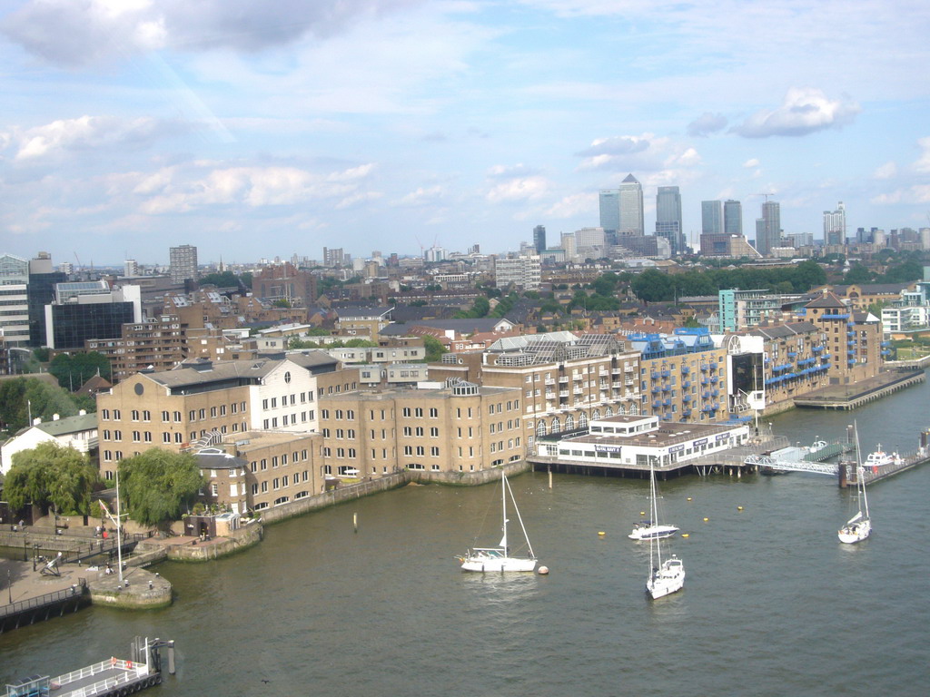 The Thames river and Canary Wharf, viewed from the east high level walkway of the Tower Bridge