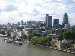 The Thames river, the Tower of London, 30 St. Mary Axe and Ten Trinity Square, viewed from the west high level walkway of the Tower Bridge