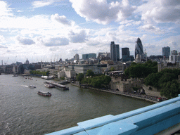 The Thames river, the Tower of London, 30 St. Mary Axe, Ten Trinity Square and St. Paul`s Cathedral, viewed from the west high level walkway of the Tower Bridge