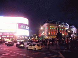 Piccadilly Circus, with the neon signs and the London Pavilion, by night