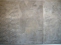 Assyrian carved stone panel, in the British Museum