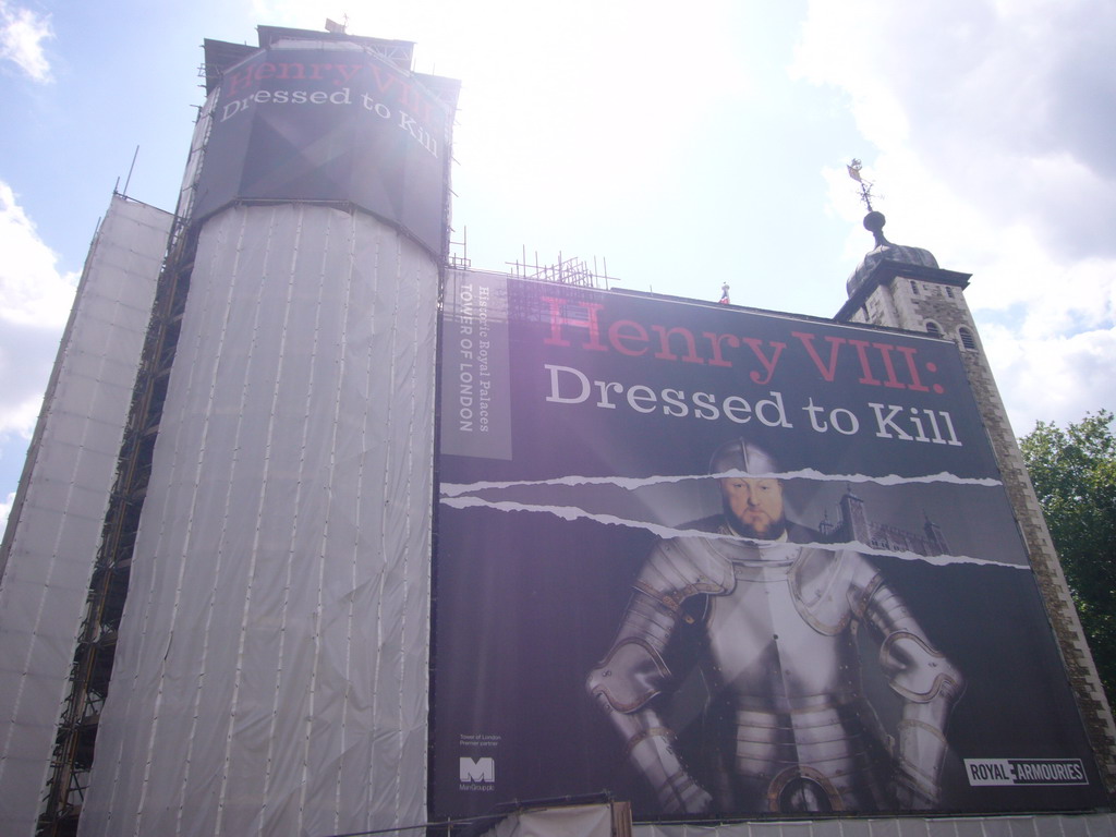 The White Tower at the Tower of London, with a poster on the Henry VIII exhibition