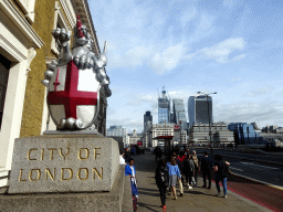 City of London statue at the southwest side of London Bridge, with a view on the House of Fraser, the 22 Bishopsgate building, under construction, the Leadenhall Building and the Sky Garden building