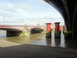 The Blackfriars Bridge over the Thames river, viewed from under the Blackfriars Railway Bridge