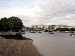 Boats in the Thames river and the Waterloo Bridge, viewed from Gabriel`s Pier