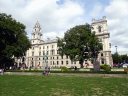 Statues at the Parliament Square Garden and the front of Her Majesty`s Revenue and Customs building