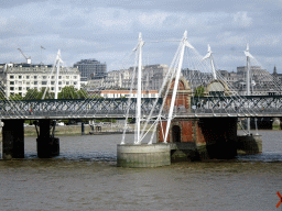 The Hungerford Bridge and Golden Jubilee Bridges over the Thames river, viewed from capsule 17 of the London Eye