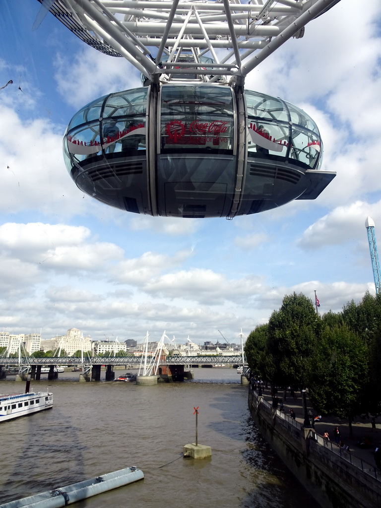 Capsule of the London Eye and the Hungerford Bridge and Golden Jubilee Bridges over the Thames river, viewed from capsule 17 of the London Eye