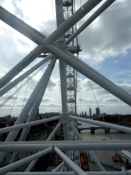 Central part of the London Eye, the Westminster Bridge over the Thames river and the Palace of Westminster, viewed from capsule 17 of the London Eye