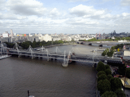 Boats in the Thames river, the Hungerford Bridge, the Golden Jubilee Bridges and the Waterloo Bridge, viewed from capsule 17 of the London Eye