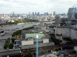 Boats in the Thames river, the Waterloo Bridge, the Royal Festival Hall, the National Theatre and St. Paul`s Cathedral, viewed from capsule 17 of the London Eye