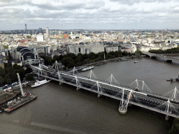 Boats in the Thames river, the Hungerford Bridge, the Golden Jubilee Bridges, the Waterloo Bridge, the Charing Cross Railway Station and the BT Tower, viewed from capsule 17 of the London Eye