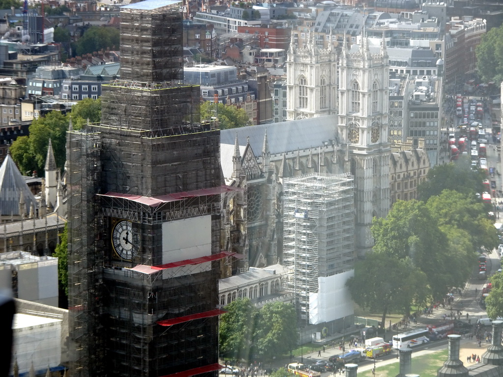 The Big Ben of the Palace of Westminster, St. Margaret`s Church, Westminster Abbey and Parliament Square Garden, viewed from capsule 17 of the London Eye
