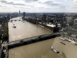 Boats in the Thames river, the Westminster Bridge, the Lambeth Bridge, the Vauxhall Bridge, the Palace of Westminster and the St. George Wharf Tower, viewed from capsule 17 of the London Eye