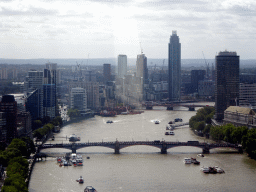 Boats in the Thames river, the Lambeth Bridge, the Vauxhall Bridge and the St. George Wharf Tower, viewed from capsule 17 of the London Eye