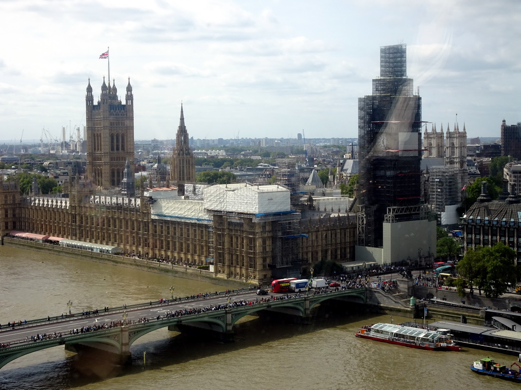 Boats in the Thames river, the Westminster Bridge, the Palace of Westminster with the Big Ben and Westminster Abbey, viewed from capsule 17 of the London Eye