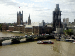 Boats in the Thames river, the Westminster Bridge, the Palace of Westminster with the Big Ben and Westminster Abbey, viewed from capsule 17 of the London Eye