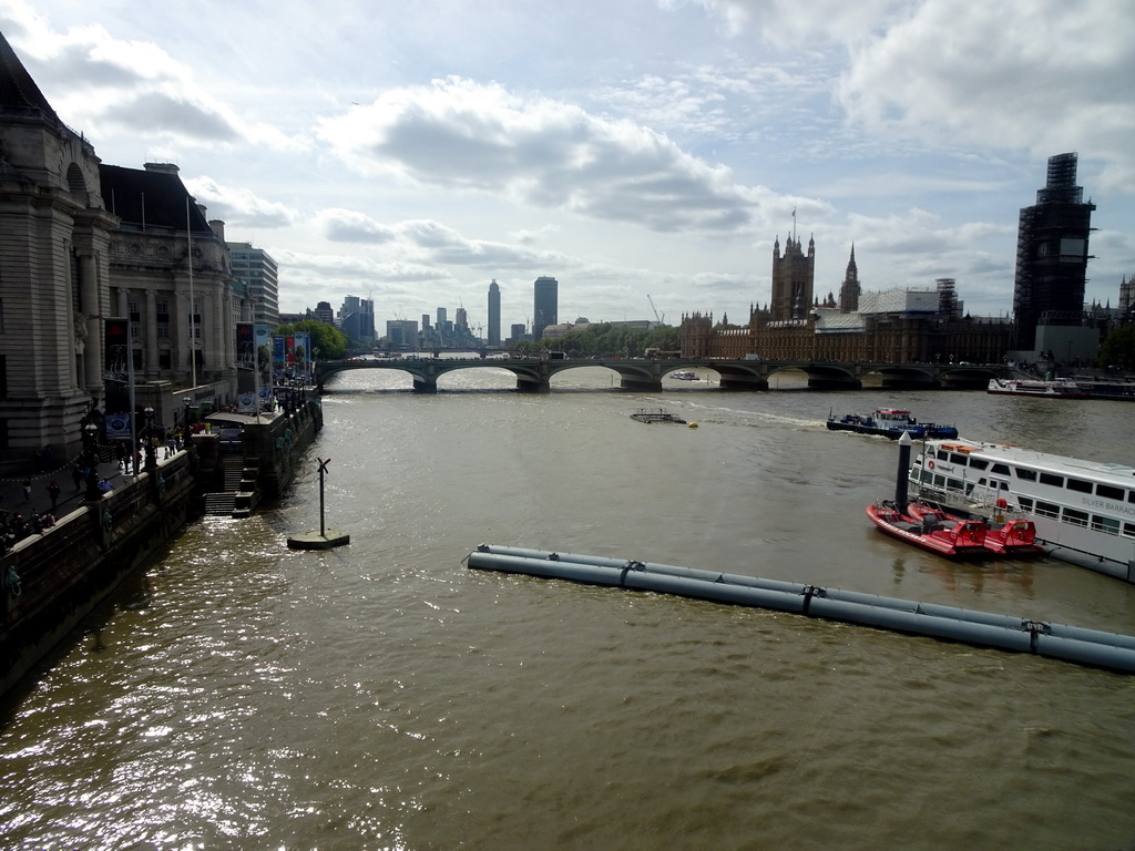 Boats in the Thames river, the Westminster Bridge, the Palace of Westminster with the Big Ben, the Lambeth Bridge and the St. George Wharf Tower, viewed from capsule 17 of the London Eye