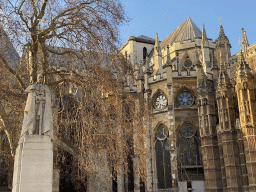 Statue of King George V and the southeast side of Westminster Abbey, viewed from the Old Palace Yard