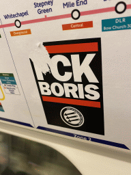 `FCK Boris` sticker in a subway train