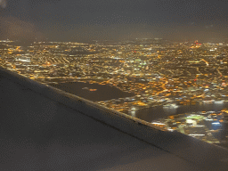 The east side of the city and the Thames river, viewed from the airplane to Amsterdam, by night