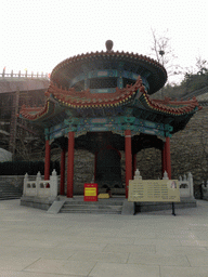 Pavilion with large bell at the southwestern side of the central square of the Nanshan Temple
