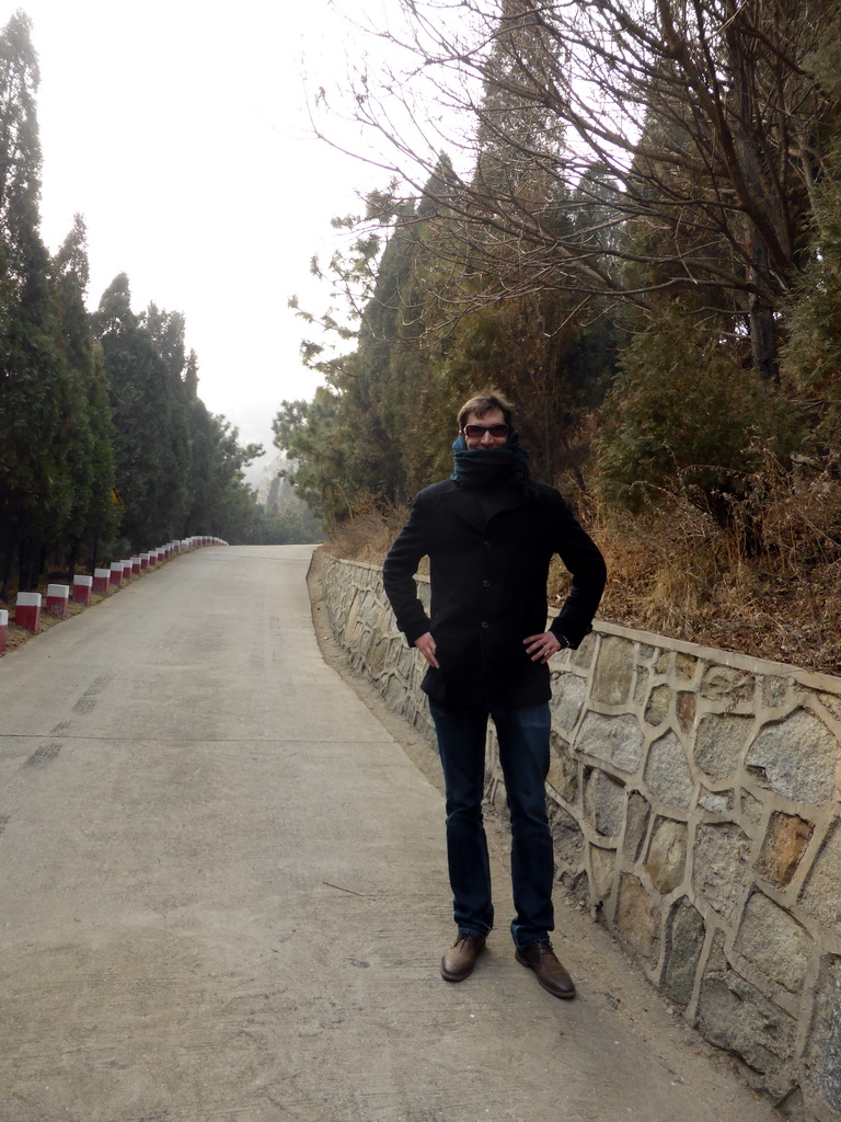 Tim on the road from the back of the Nanshan Great Buddha to the Nanshan Temple