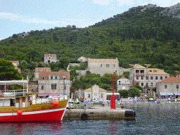 Boats at the Lopud Harbour and the Plaa Dubrava Pracat beach, viewed from the Elaphiti Islands tour boat