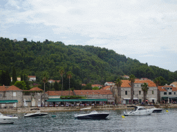 Boats in front of houses at the Obala Iva Kuljevana street, viewed from the Elaphiti Islands tour boat