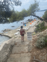 Miaomiao at the beach in front of the Church of Sveta Marija od pilice