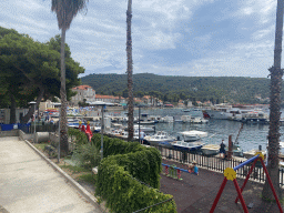 Boats at the Lopud Harbour, the Plaa Dubrava Pracat beach and the Obala Iva Kuljevana street