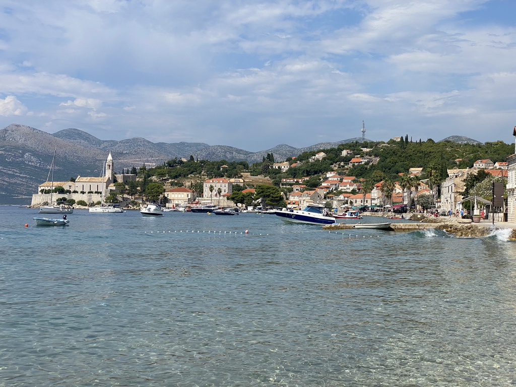 Boats at the Lopud Harbour, the Plaa Dubrava Pracat beach and the Church of Sveta Marija od pilice, viewed from the Plaa Grand beach