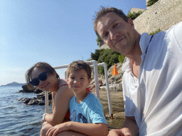 Tim, Miaomiao and Max at the beach in front of the Church of Sveta Marija od pilice