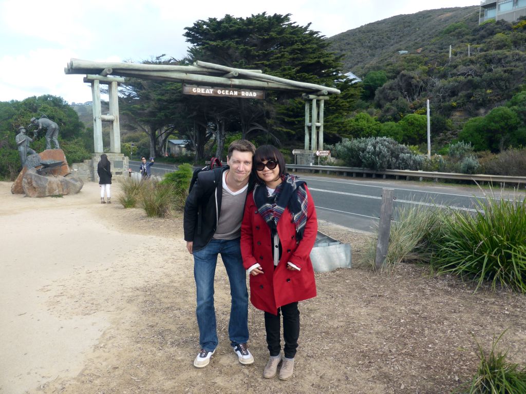 Tim and Miaomiao in front of the Great Ocean Road Memorial Arch and Memorial Sculpture at Eastern View
