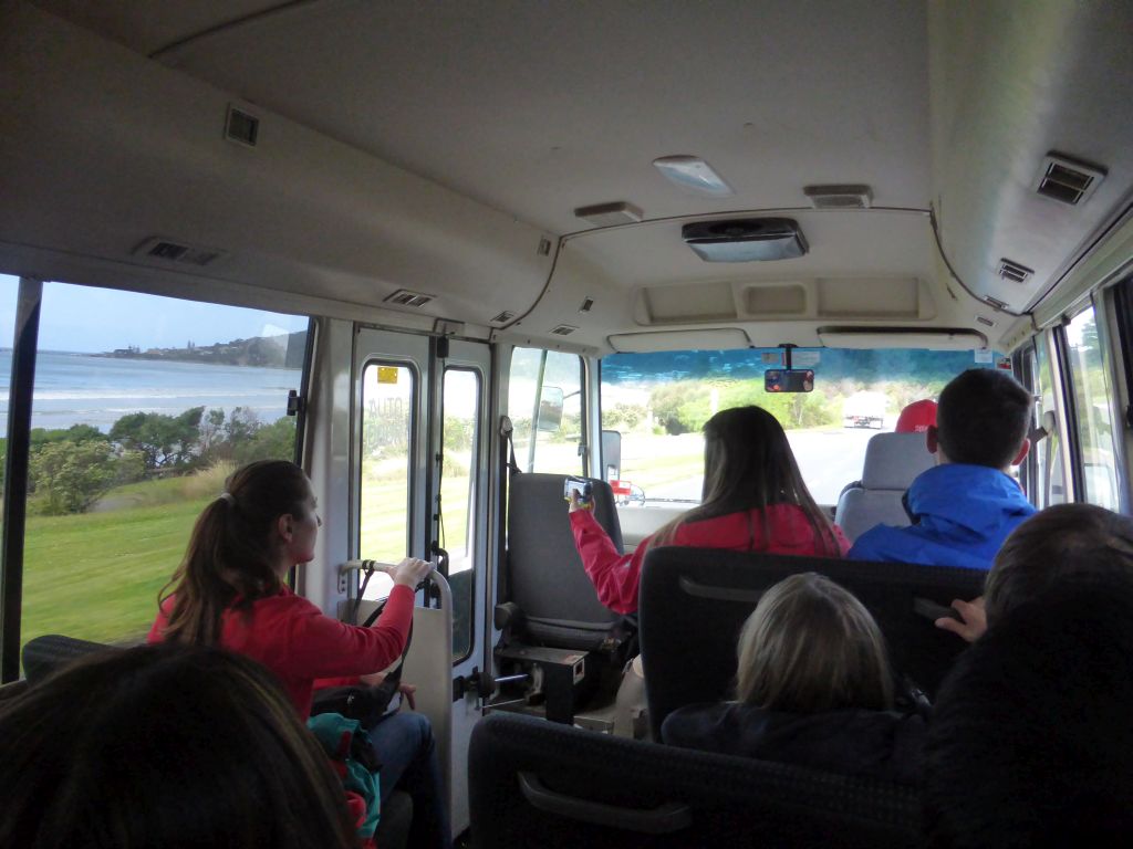 Interior of our tour bus, driving on the Great Ocean Road