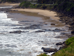Beach at the coastline at the Cumberland River Holiday Park, viewed from a viewing point next to the Great Ocean Road