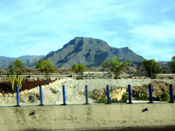 The Roque del Conde mountain, viewed from the rental car on the Autopista del Sur road