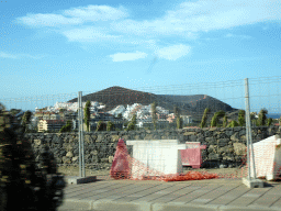 The town of Los Cristianos and the Chayofita Mountain, viewed from the rental car on the Calle Portazgo street