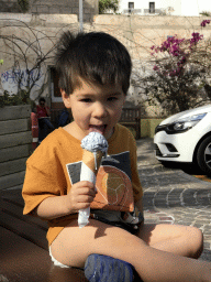 Max with an ice cream at the Calle del Valle Menéndez street