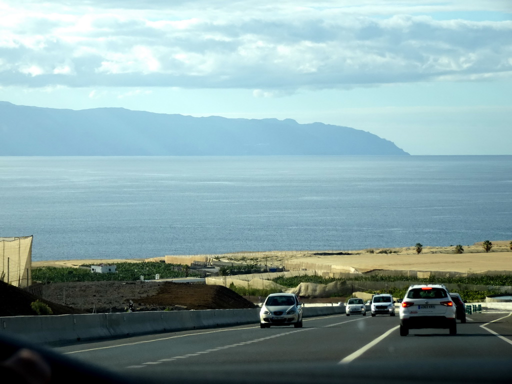 The TF-46 road near the town of La Gambueza and the island of La Gomera, viewed from the rental car