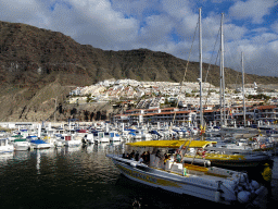 Boats in the Puerto de los Gigantes harbour, viewed from the Calle Poblado Marinero street