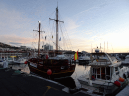 Boats in the Puerto de los Gigantes harbour, viewed from the Calle Poblado Marinero street, at sunset